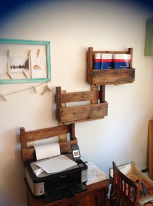 Pallet shelves made for my partner's office as a place for textbooks and stationery.